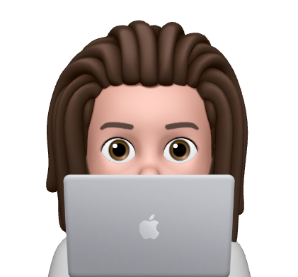 Memoji of Zach on his laptop